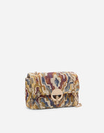 Moyen Sac Moon Vanessa Bruno en jacquard multicolore tissé, fermoir doré coulissant et chaîne.