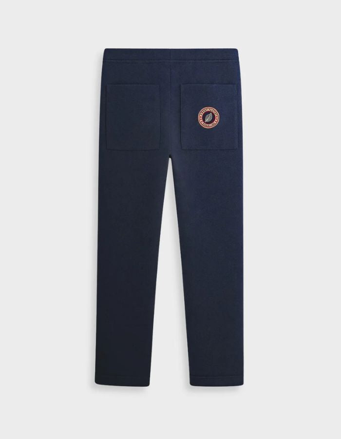 Dos du Pantalon de jogging ajusté coupe droite pour homme et femme en molleton bleu nuit 350g avec cordon beige et patch logo dos, modèle Iconic Straight couleur Night de Sweet Pants.