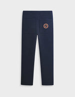 Dos du Pantalon de jogging ajusté coupe droite pour homme et femme en molleton bleu nuit 350g avec cordon beige et patch logo dos, modèle Iconic Straight couleur Night de Sweet Pants.