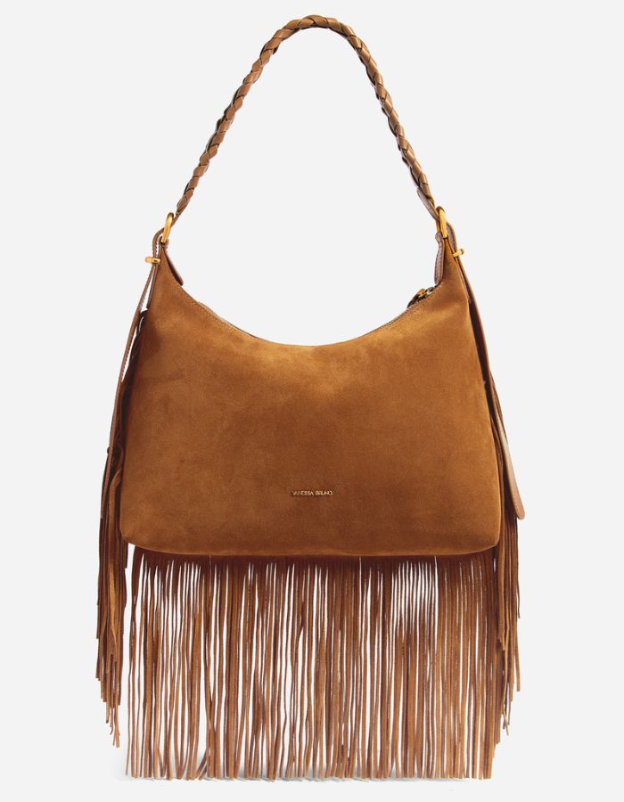 Petit sac hobo Jess noisette en cuir souple avec franges longues et bandoulière tressée.