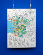 Poster géant à colorier de la France, avec des régions partiellement coloriées en vert, jaune, bleu et orange.