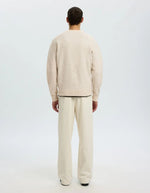 Dos du Pull pour homme en maille douce écru avoine à col rond enrichi en alpaga et laine, modèle Rai LS Knit Reg Crew Neck couleur Oatmeal de la marque Selected Homme.