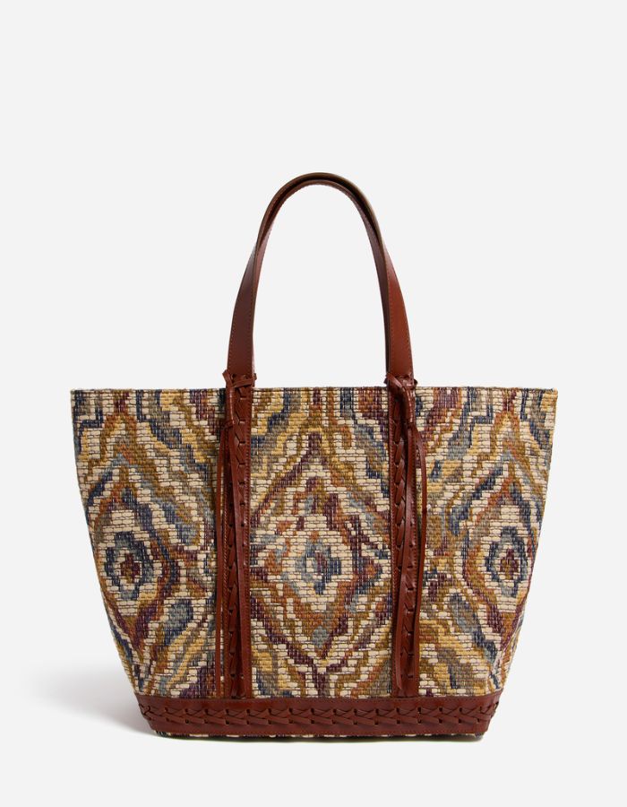 Grand cabas jacquard multicolore bohème avec anses et finitions en cuir marron.