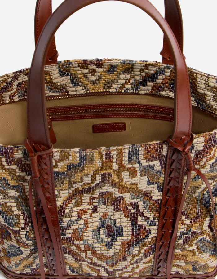 Cabas L zippé en toile jacquard multicolore bohème avec anses et finitions en cuir marron.