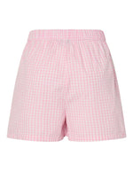Dos du Short taille haute de la marque PIECES avec imprimé Vichy rose et blanc. Taille élastiquée et coupe standard (regular fit). Confectionné en coton biologique et polyester recyclé.