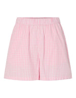Short taille haute de la marque PIECES avec imprimé Vichy rose et blanc. Taille élastiquée et coupe standard (regular fit). Confectionné en coton biologique et polyester recyclé.