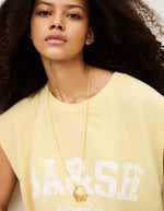 Sweat Beata Jaune Ba&sh sans manches en coton biologique, encolure ronde, logo blanc.