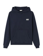 Sweat à capuche oversize bleu marine délavé pour homme en molleton coton doux avec poche kangourou et finition peau de pêche, modèle Plizzy couleur Navy Vintage de la marque American Vintage