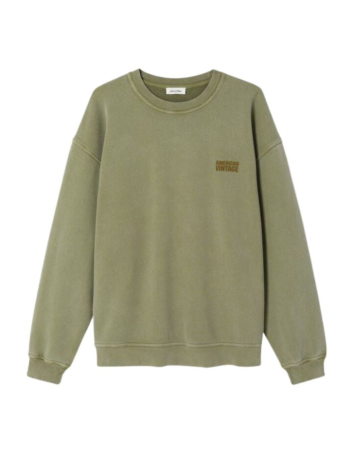 Sweat col rond oversize en coton molleton vert pistou avec discret motif imprimé sur la poitrine