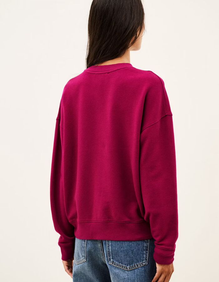 Dos du Sweatshirt pour femme en coton biologique rose, modèle Benjamin de la marque ba&sh. Présente une coupe confortable confectionnée au Portugal.