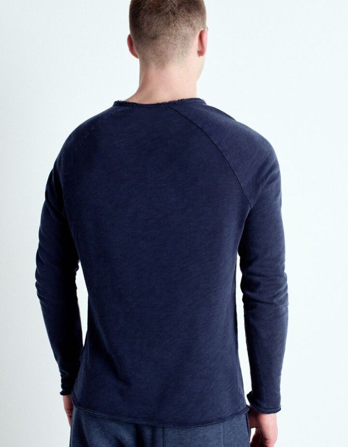 Dos du T-shirt à manches longues pour homme de couleur blanc uni, modèle Sonoma de la marque American Vintage. Présente une coupe droite en coton flammé épais texturé avec un col rond et des manches de style raglan.