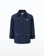 Veste mi-longue imperméable et coupe-vent indigo pour homme et femme avec col contrasté, capuche amovible et 4 poches, modèle Veste Archives couleur Indigo de la marque Flotte.