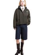 Veste imperméable oversize mixte kaki avec détails plissés, effet bouffant et capuche amovible, modèle Garance couleur Kaki de la marque Flotte
